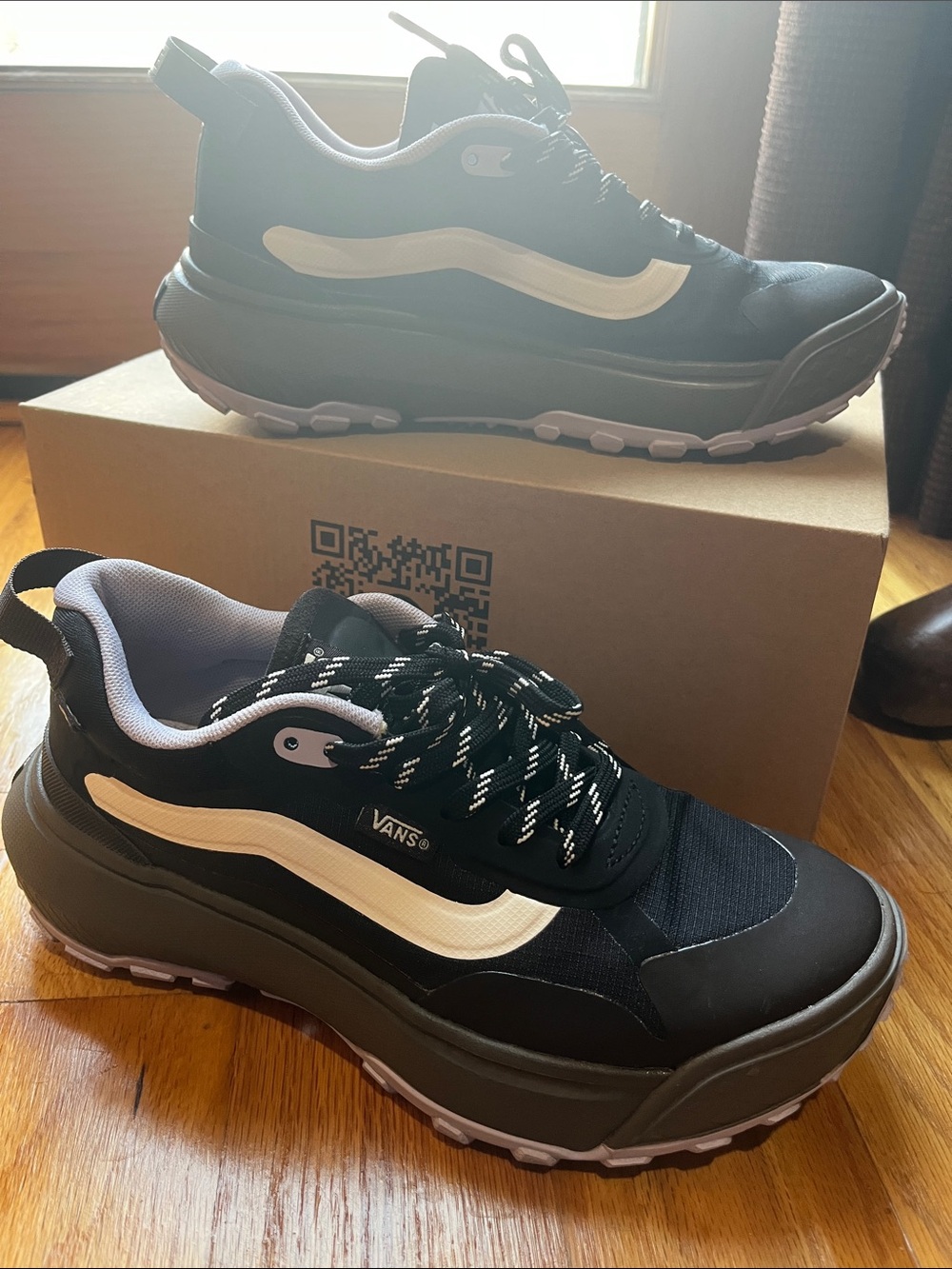 Vans women’s  Black and White Platform Trail Sneakers